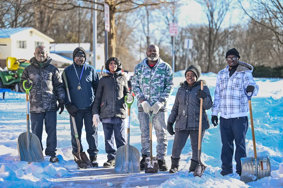 Staff at Laurel Ridge ES pose with shovels in the snow
