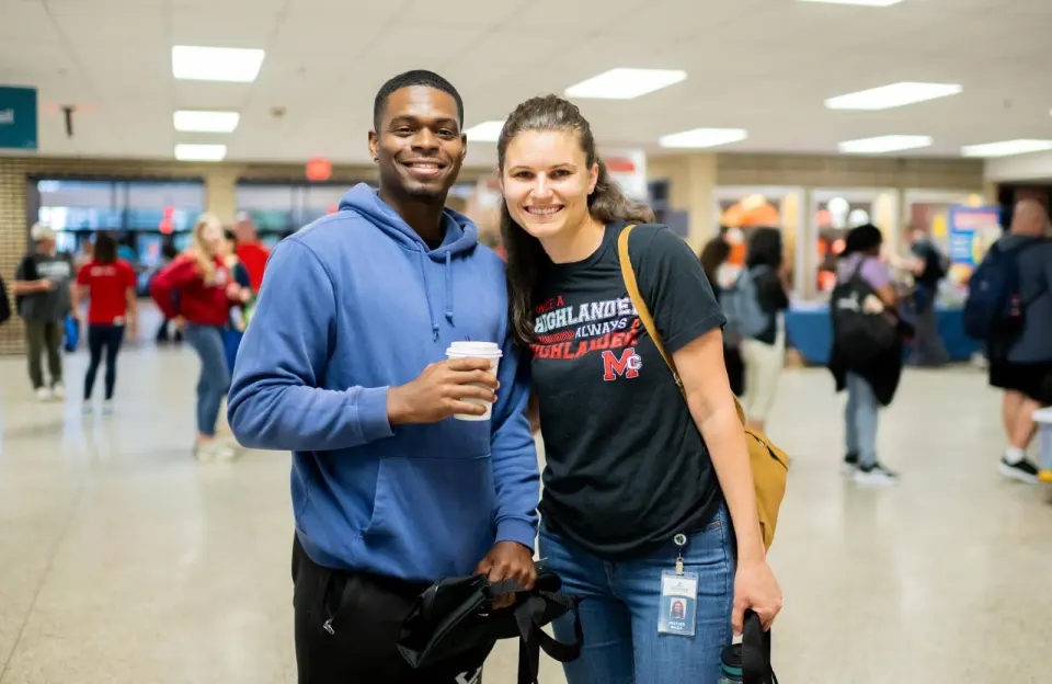 new teachers smile for a photo