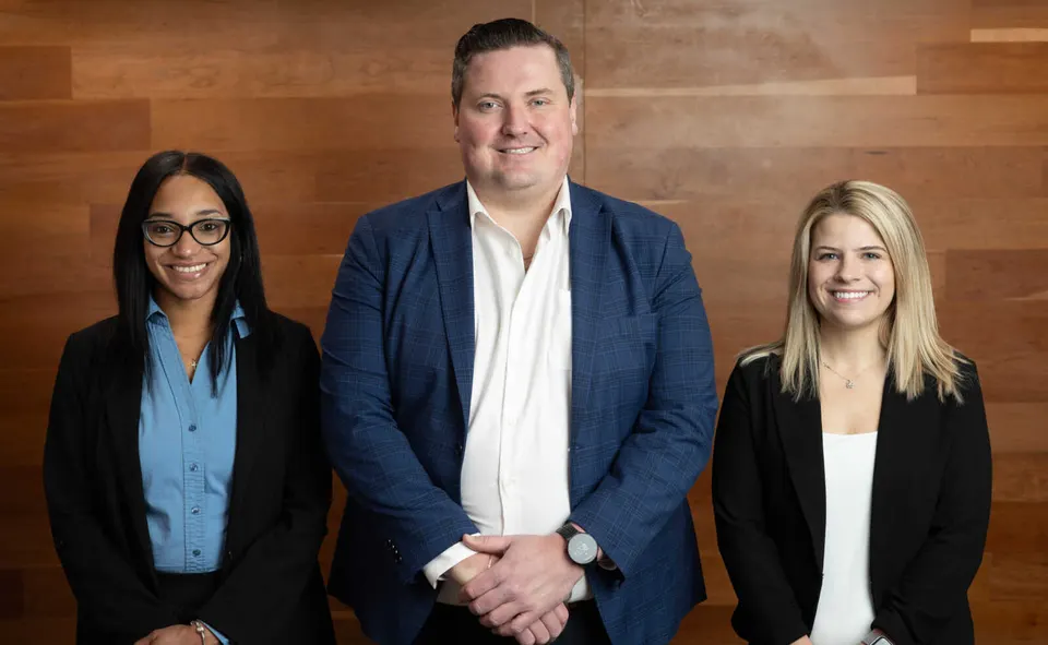 Left to right: AtWork Tysons business development manager Morgan Hill, franchise owner Dan Garvey and recruiter Kylie Johnson (courtesy AtWork)