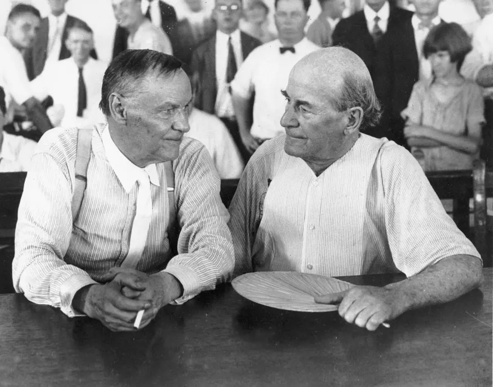 Covering the 1925 Scopes Evolution Trial in Dayton Tennessee: Defense attorney Clarence Darrow (left) and prosecutor William Jennings Bryan (right) chat during the famous trial...
