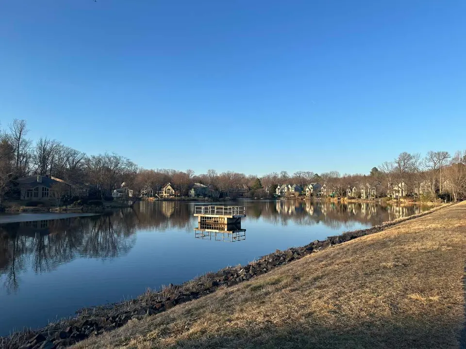 Platform in the middle of a placid Lake Newport in Reston (staff photo by Angela Woolsey)
