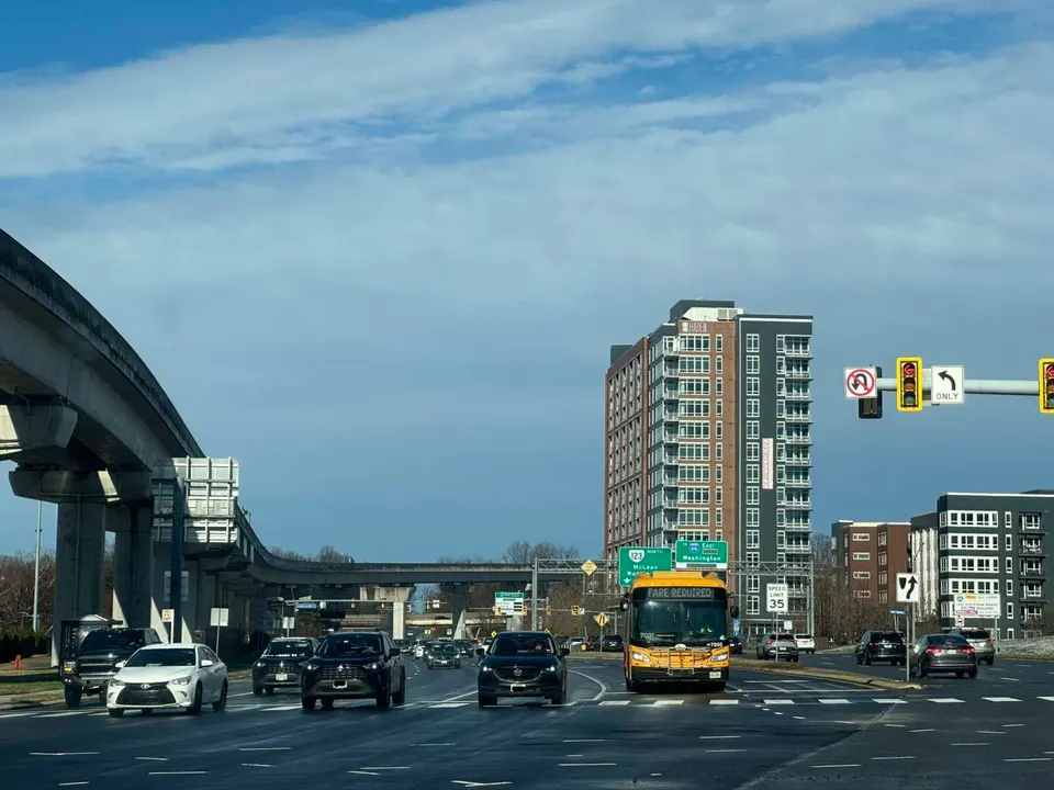 Haden apartments with westbound traffic on Route 123 at Scotts Crossing Road in Tysons (staff photo by Angela Woolsey)