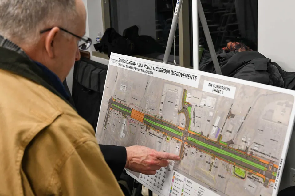 Residents attend an in-person update on the Richmond Highway Bus Rapid Transit (BRT) project at the Gerry South Hyland Government Center on Jan. 15, 2025 (staff photo by James...