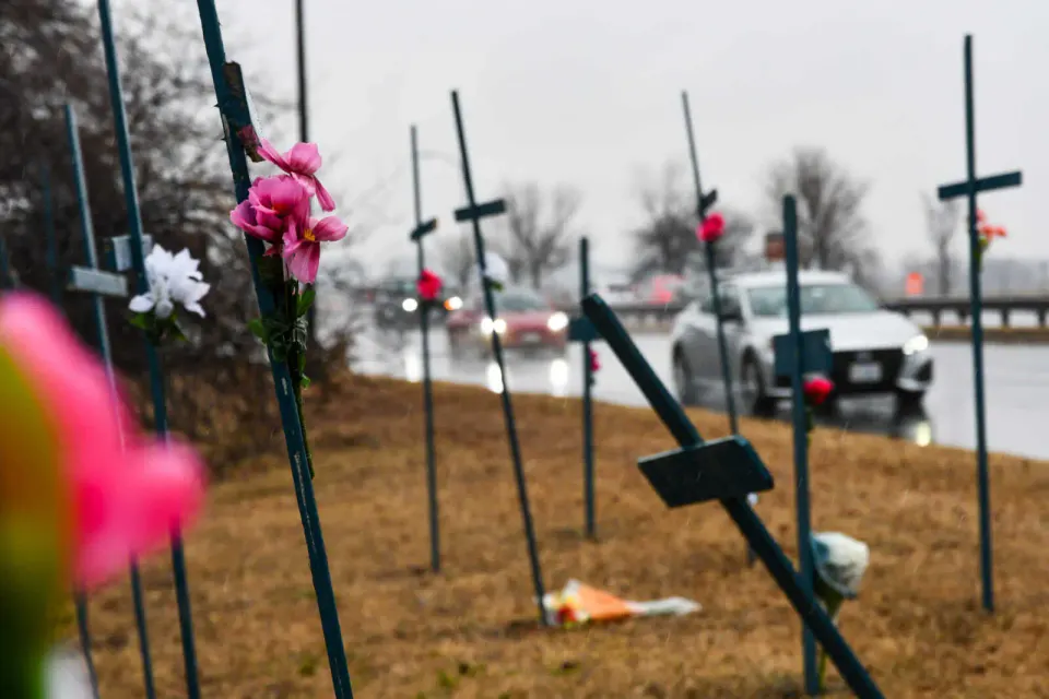 Nearly two dozen crosses stand near Gravelly Point, honoring the 67 victims of the mid-air collision over the Potomac River (staff photo by James Jarvis)