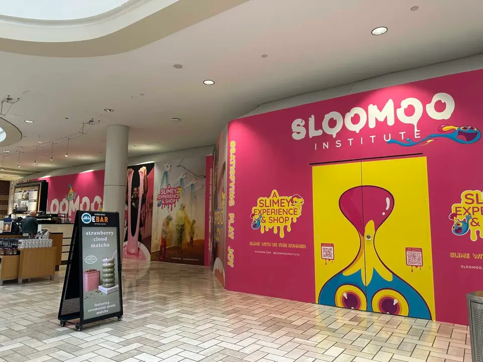 Construction wall for Sloomoo Institute, coming to Tysons Corner Center (staff photo by Angela Woolsey)