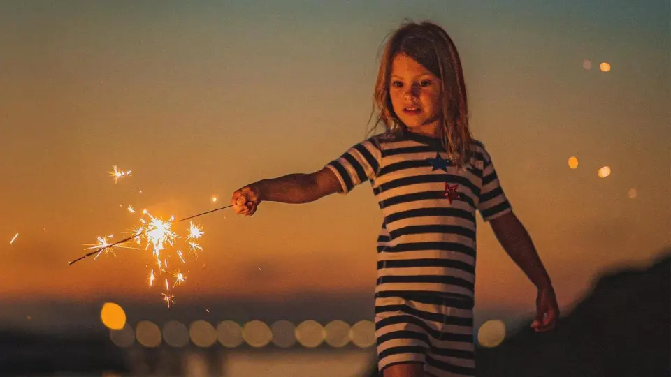 Fourth of July sparklers: "...we’d become more creative. I remember lighting a sparkler at both ends...." Photo Courtesy Visit Southwest Michigan.