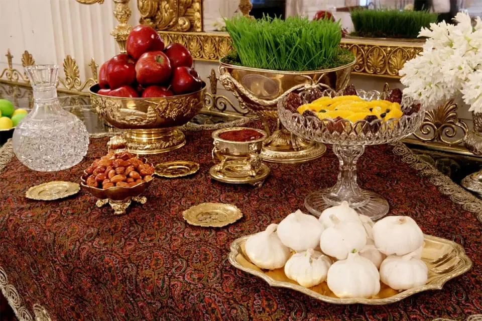 Haft-sin table-setting to celebrate Nowruz. Courtesy SurfIran.