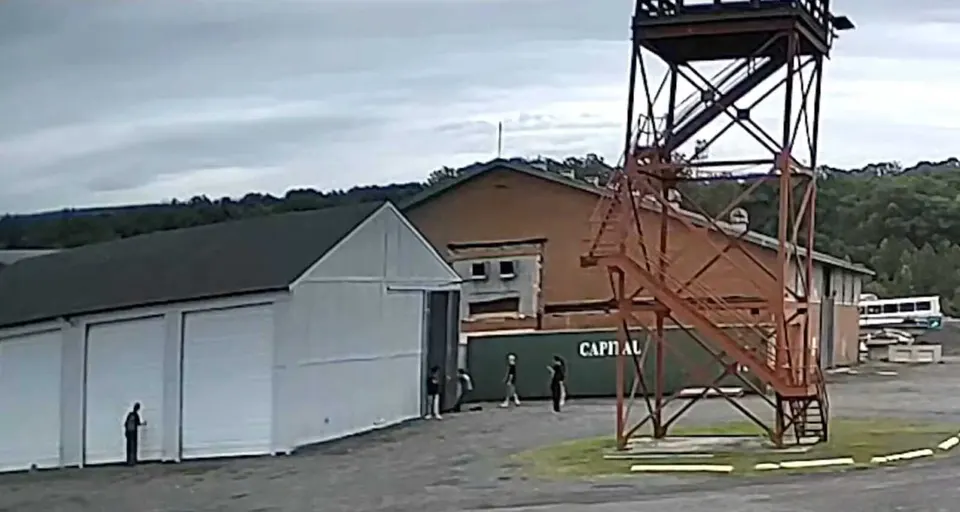 Surveillance footage of people at Virginia Task Force 1’s training site in Lorton before a fire (via FCFRD/X)