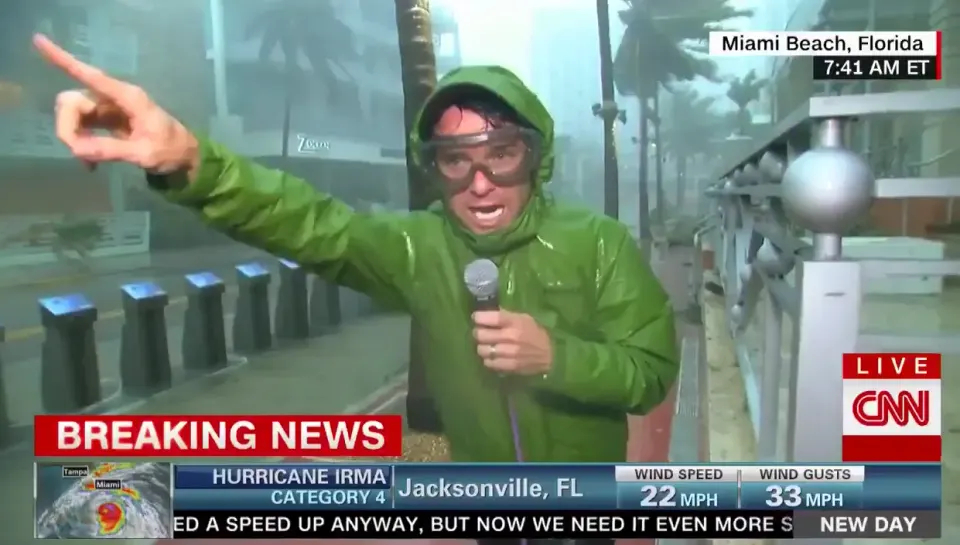 "CNN Meteorologist Derek Van Dam battles fierce winds as he delivers a live report from hurricane-hammered Miami Beach...." Courtesy The Sun.UK.