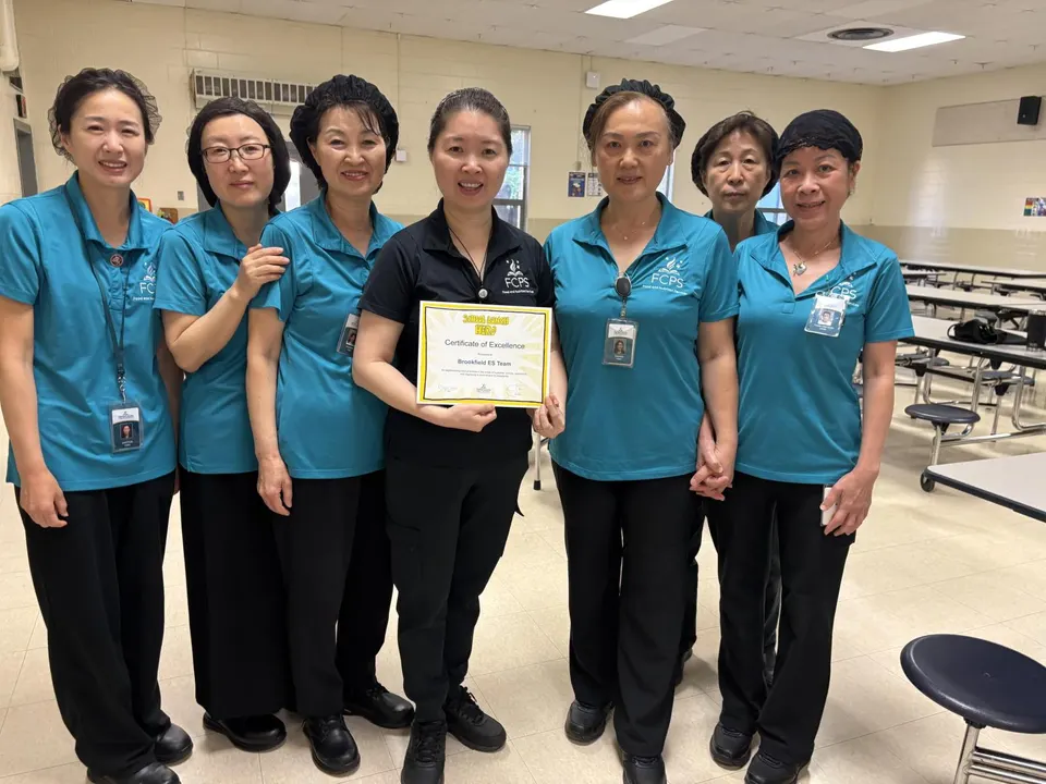 Group photo of kitchen staff.