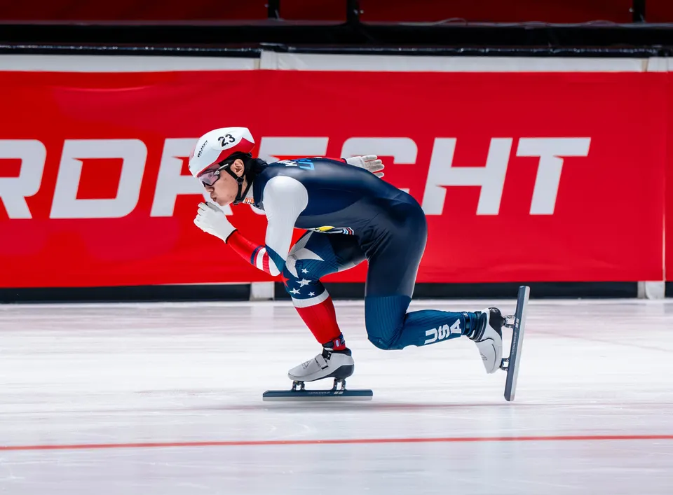 Brandon Kim competes in short track speedskating.