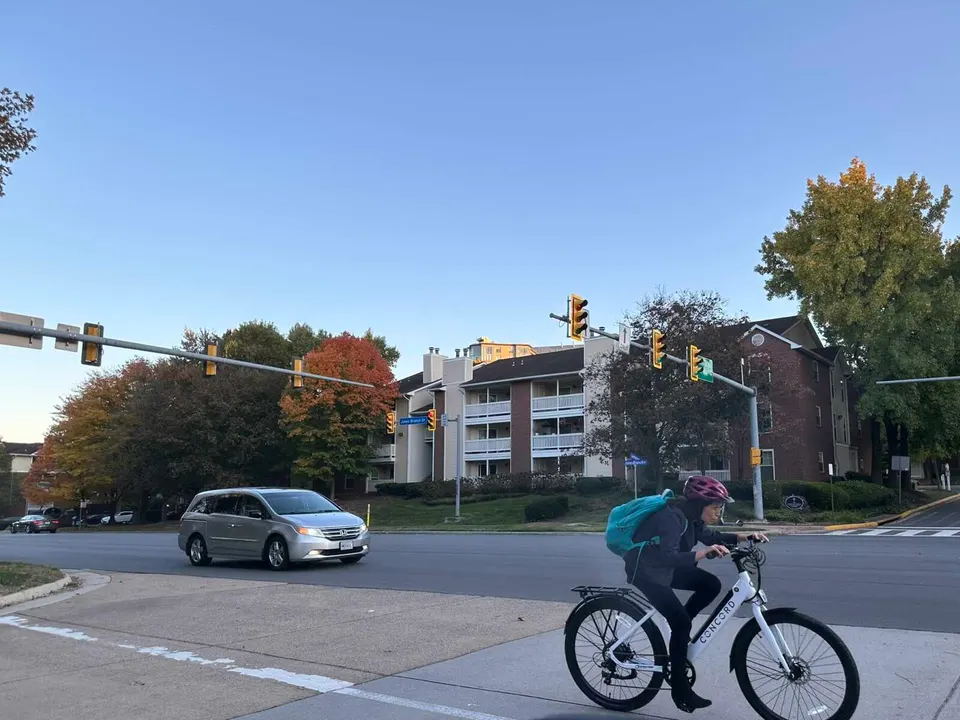 A cyclist heading east on Jones Branch Drive in Tysons (staff photo by Angela Woolsey)