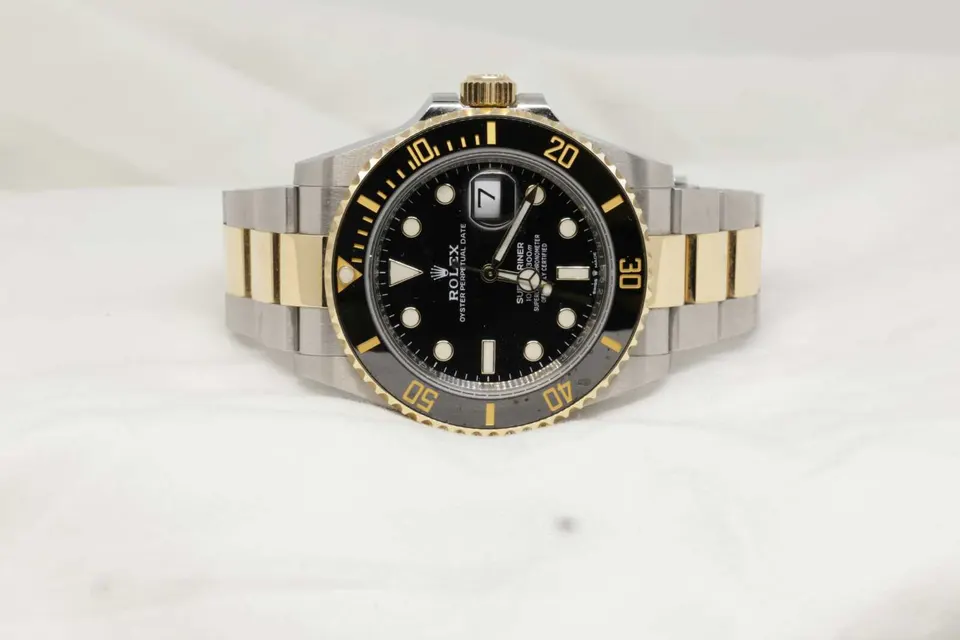 A Rolex watch (photo via Daniel Hay on Unsplash)
