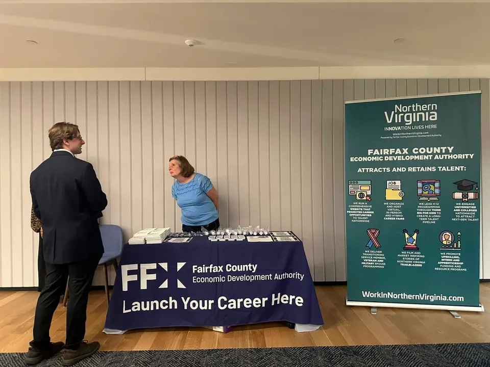 The Fairfax County Economic Development Authority’s booth at an Aug. 13, 2025 job fair organized by the University of Virginia (staff photo by Angela Woolsey)