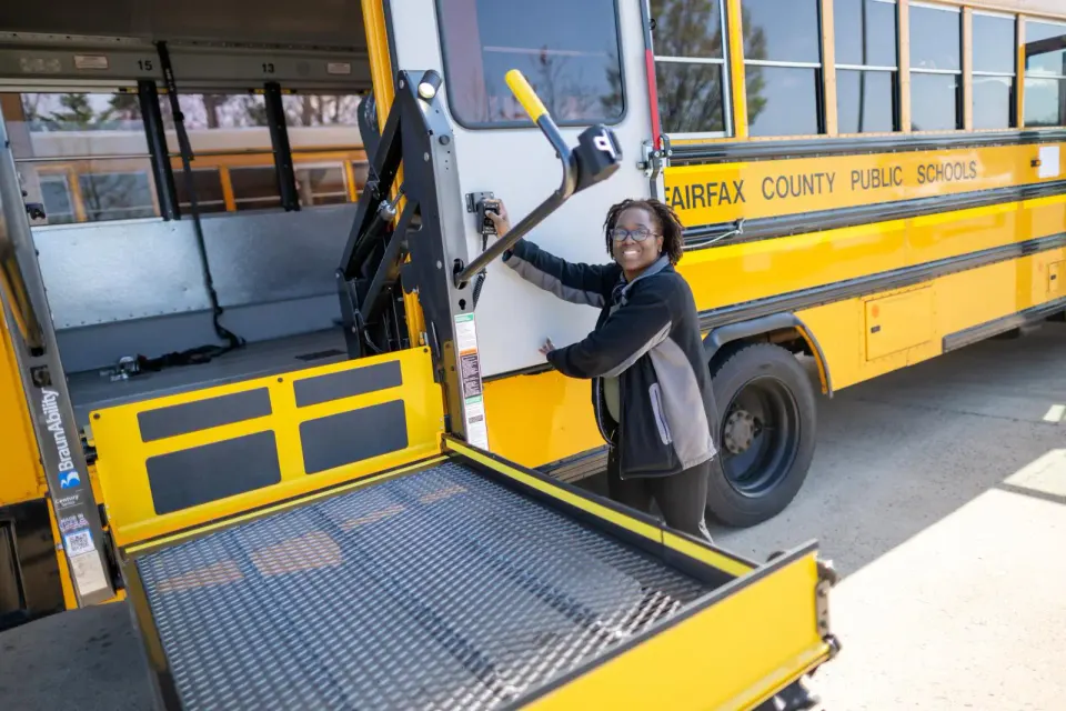 Tashima works the bus lift