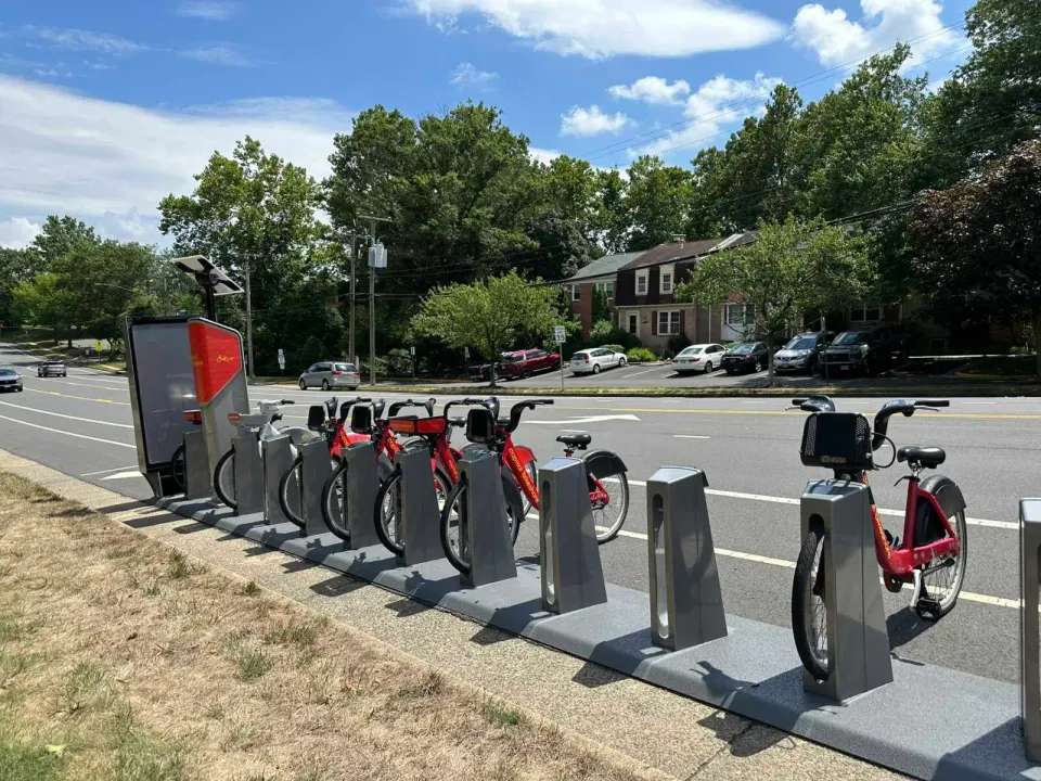 The Capital Bikeshare docking station on Hilltop Road in Merrifield (staff photo by Angela Woolsey)