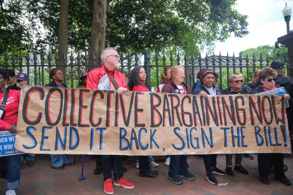 Public workers associated with unions called for Gov. Abigail Spanberger to sign the original legislation expanding collective bargaining rights (via Bert Shepherd)