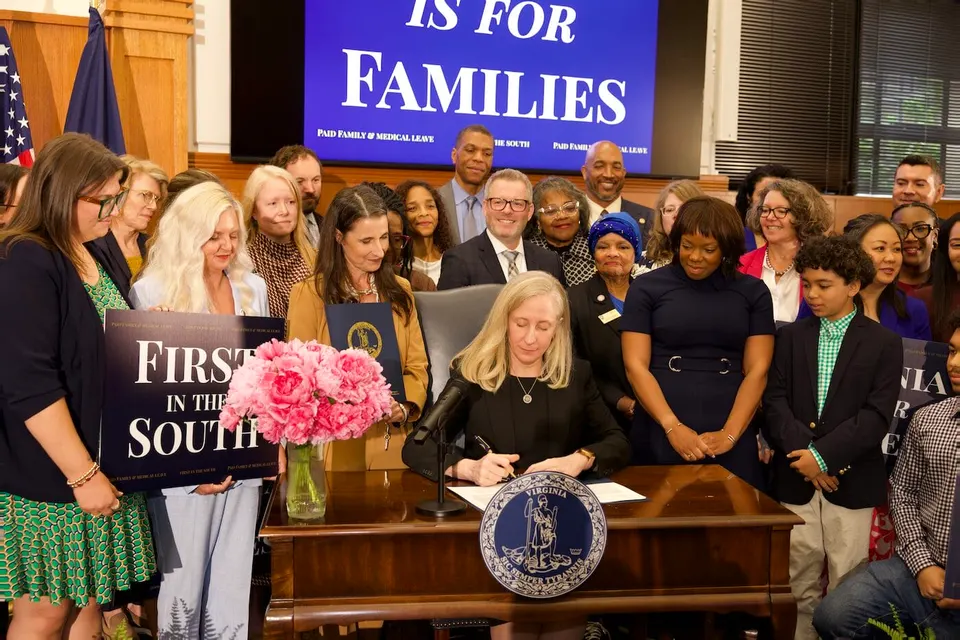 Gov. Abigail Spanberger signs legislation on Monday, May 11 that will create a paid family and medical leave program in Virginia (via Office of Gov. Abigail Spanberger)