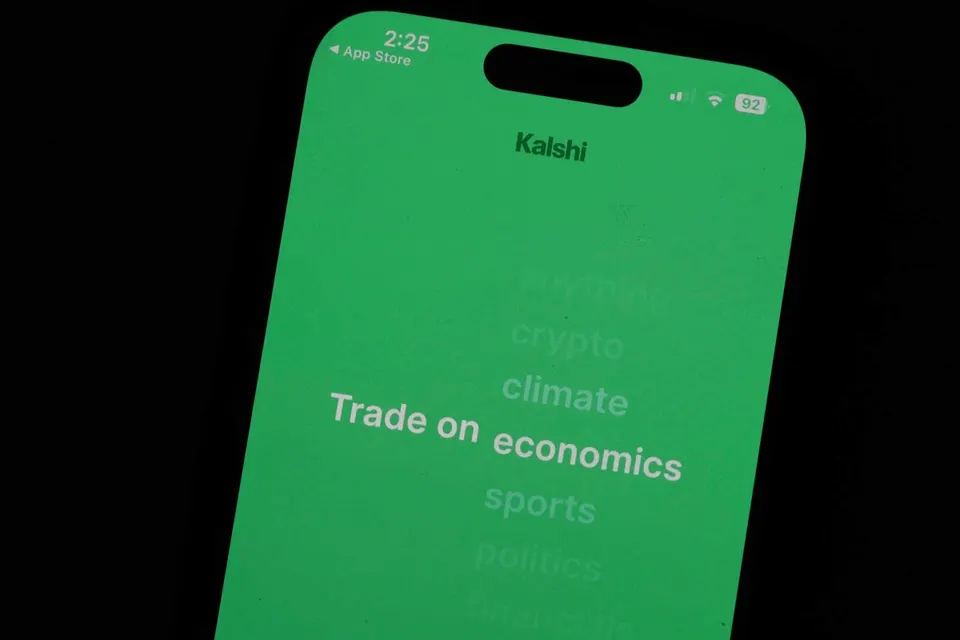 FILE – The prediction market app Kalshi is displayed on a mobile phone, April 16, 2026, in Chicago. (AP Photo/Erin Hooley, File)