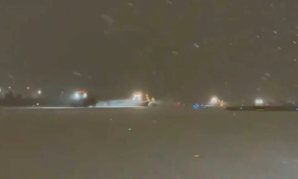 Snowplows clear airfield at Dulles International Airport during Winter Storm Fern (via Dulles Airport/X)